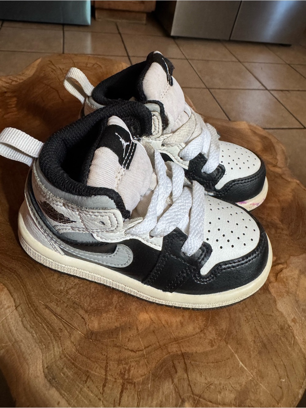 Jordan Kids Black and White High-Top Sneakers